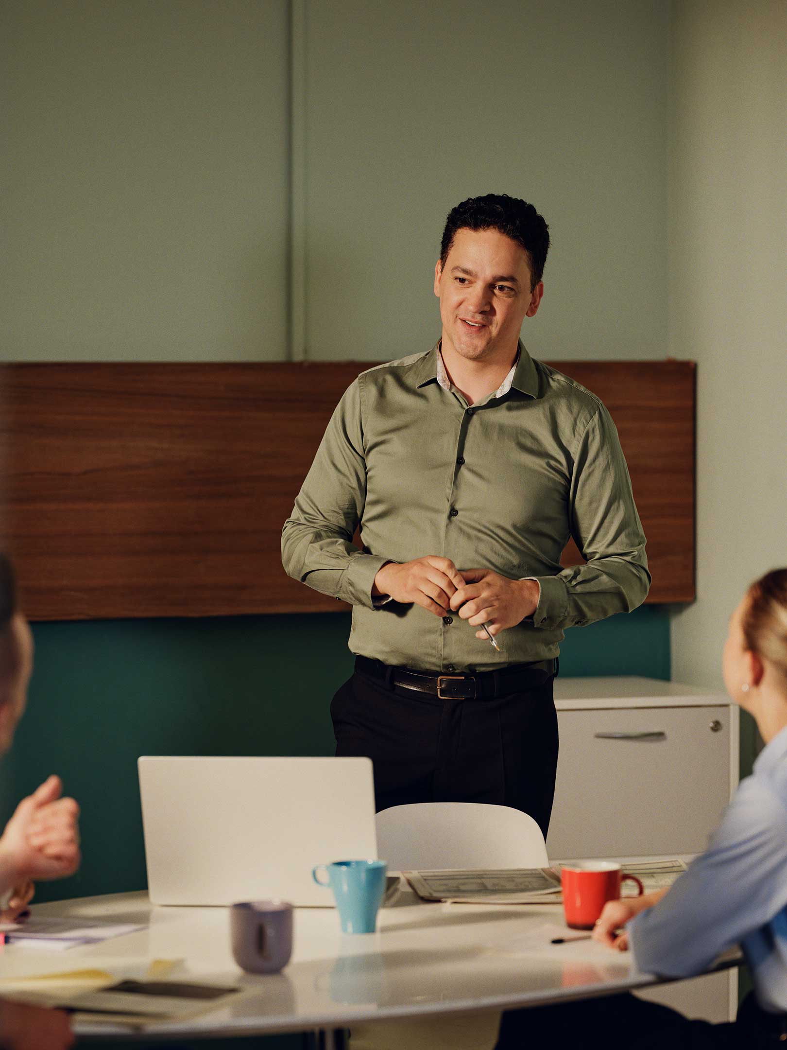 Male teacher standing